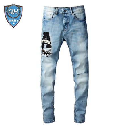 Amiri Logo Patch Rip Jeans Blue